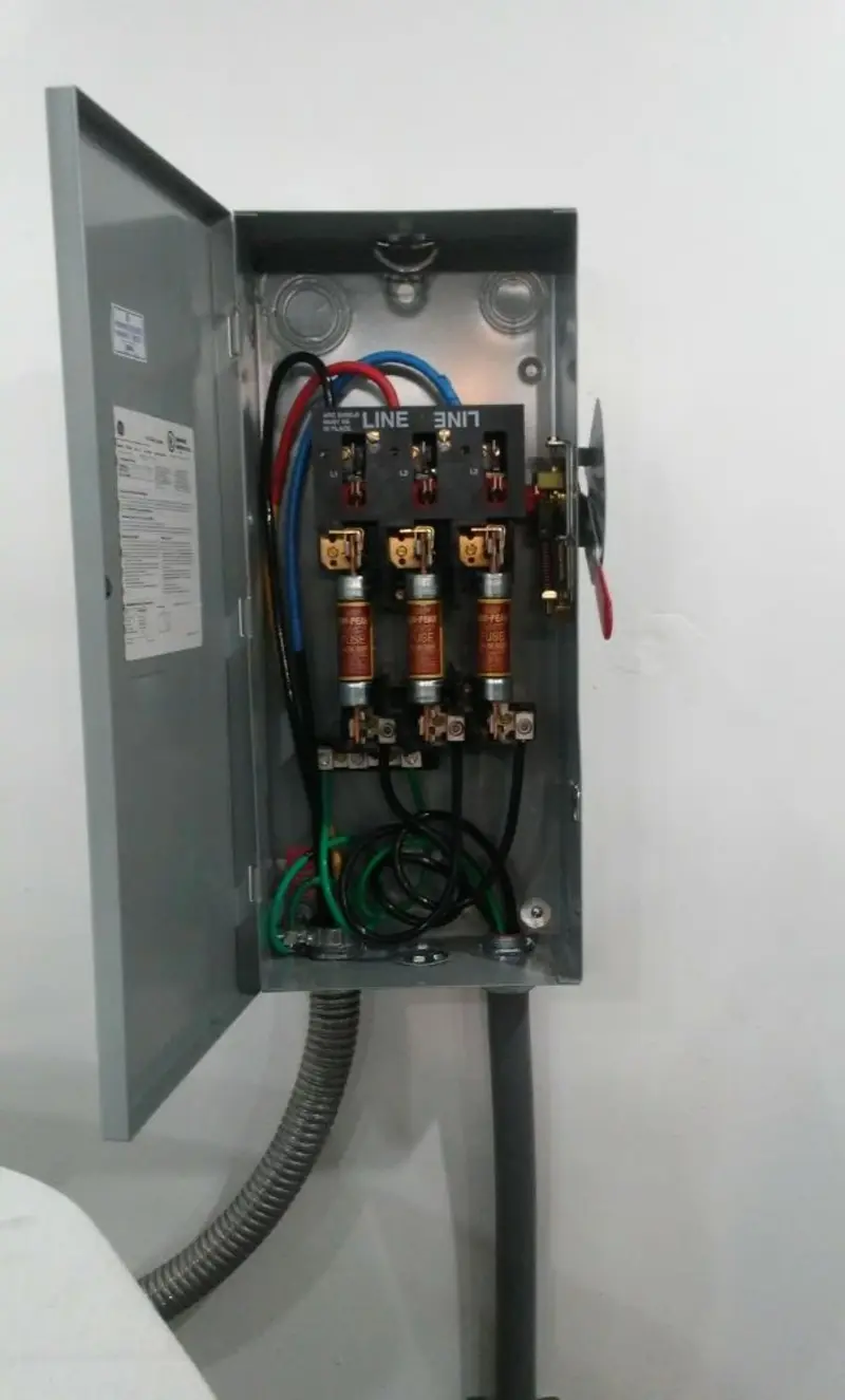 Three-phase disconnect switch installed for Smoke Detector Installation in Stuart
